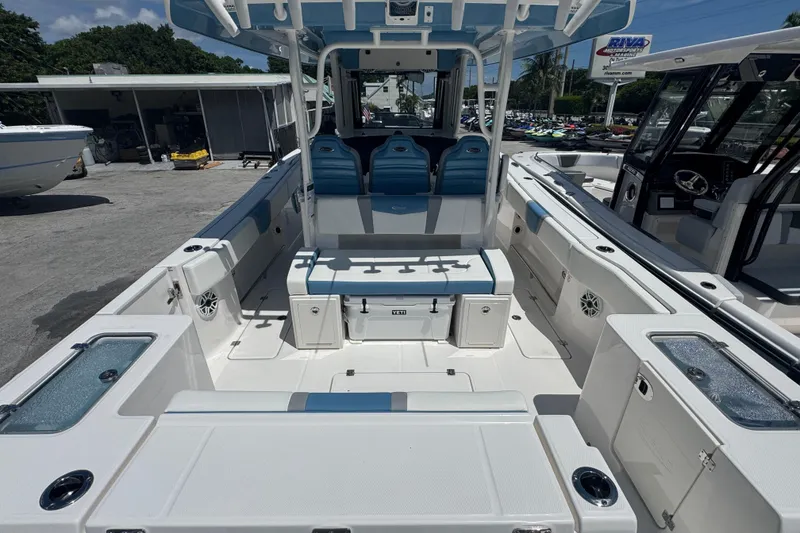 Slide: The Image of 2026 Robalo R300 Center Console boat interior with seating and storage compartments. - 5