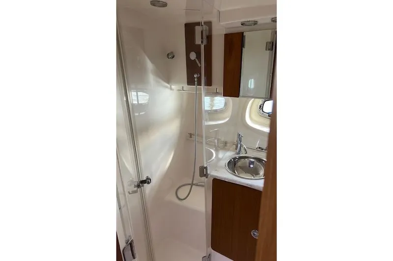Slide: The Image of 2014 Tiara Yachts 3900 Coronet bathroom with shower and sink. - 22