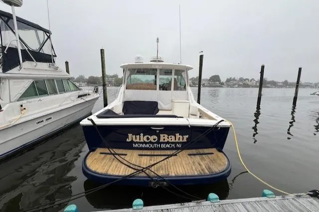 Slide: The Image of 2014 Tiara Yachts 3900 Coronet docked, rear view, Monmouth Beach, NJ. - 3