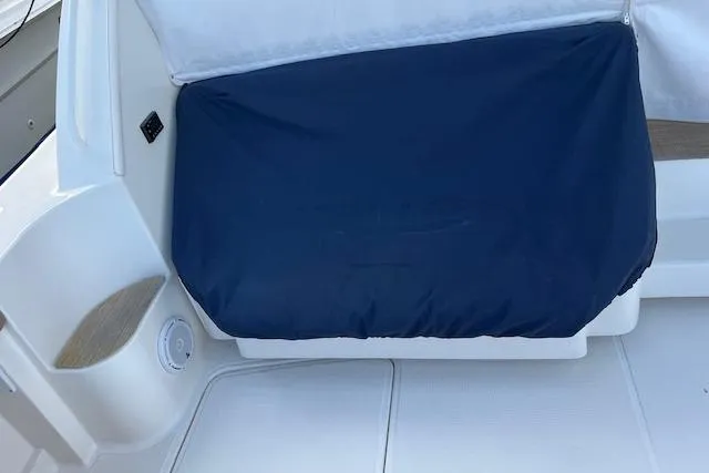 Slide: The Image of 2014 Tiara Yachts 3900 Coronet interior seating with blue cover. - 30