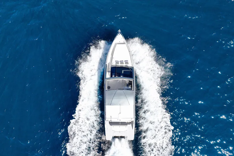 Slide: The Image of Aerial view of 2025 VALIATT YACHTS 380 Bowrider cruising on blue ocean waters. - 26