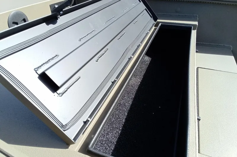 Slide: The Image of Open storage compartment in 2026 Thor 1754 Timber Hammer boat. - 14