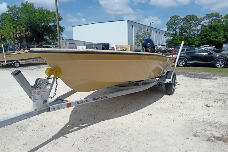 Slide: The Image of 2025 Fibercraft F16 boat on trailer in outdoor setting. - 15