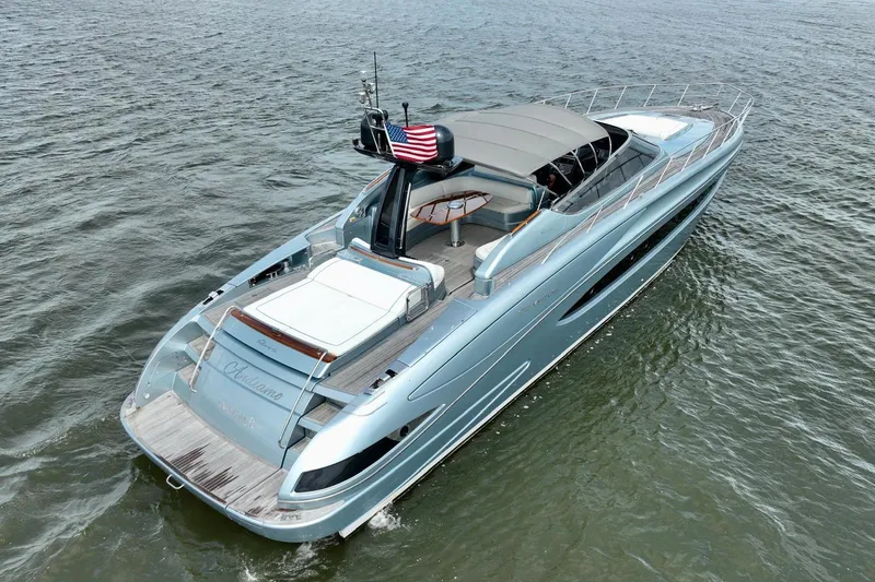 Slide: The Image of 2016 Riva 63 Virtus luxury yacht cruising on open water. - 17