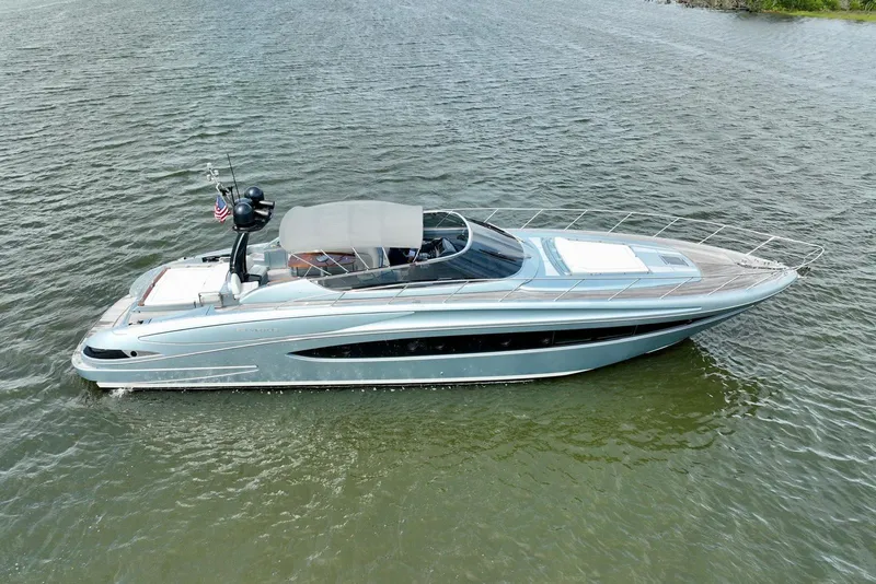 Slide: The Image of 2016 Riva 63 Virtus luxury yacht cruising on open water. - 19