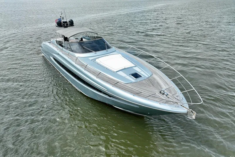 Slide: The Image of 2016 Riva 63 Virtus luxury yacht cruising on open water. - 20