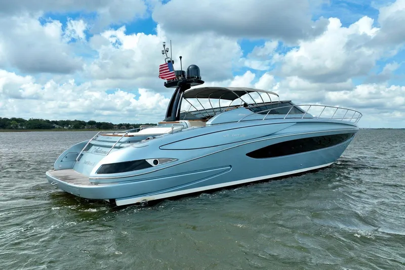 Slide: The Image of Luxury 2016 Riva 63 Virtus yacht on open water under cloudy sky. - 21