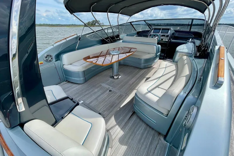 Slide: The Image of Luxurious 2016 Riva 63 Virtus yacht interior with elegant seating and sleek design. - 34