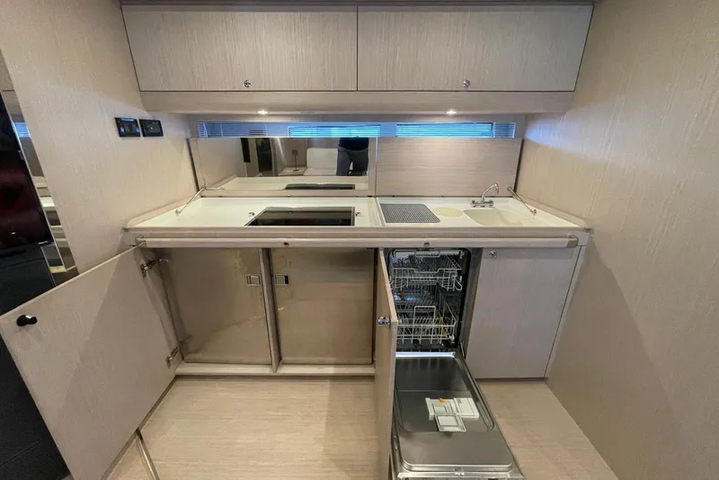 Slide: The Image of Modern kitchen interior of 2016 Riva 63 Virtus yacht with sleek cabinetry and appliances. - 39