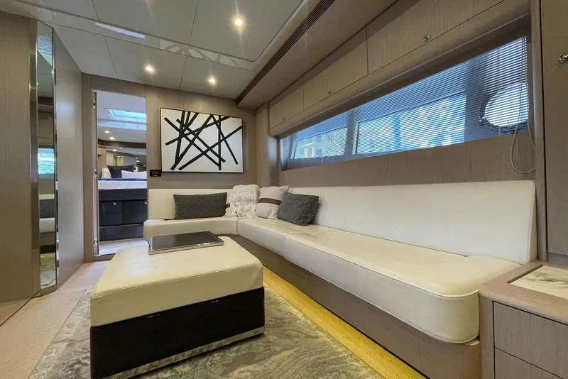Slide: The Image of Luxurious interior of 2016 Riva 63 Virtus yacht with modern decor and comfortable seating. - 42