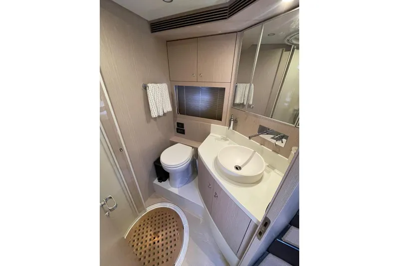 Slide: The Image of Luxurious bathroom in 2016 Riva 63 Virtus yacht with modern fixtures and elegant design. - 44