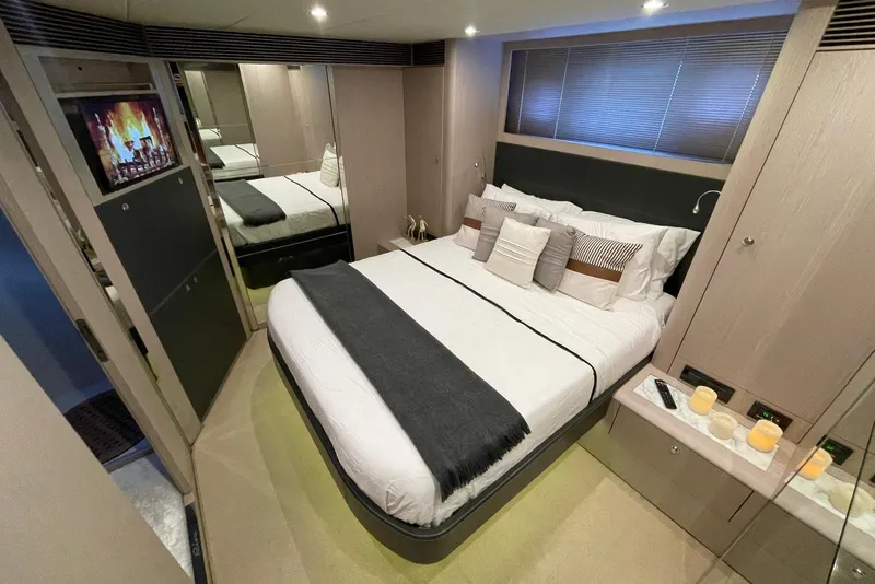 Slide: The Image of Luxurious bedroom interior of 2016 Riva 63 Virtus yacht with modern decor and ambient lighting. - 49