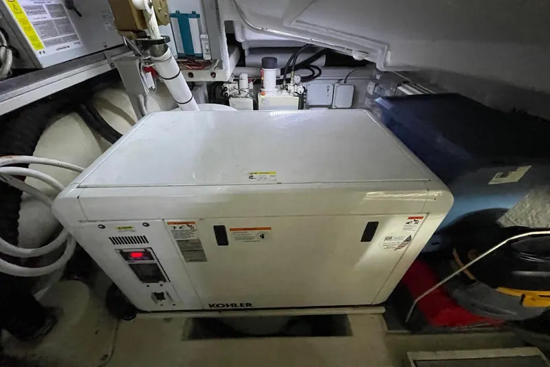 Slide: The Image of Engine room of 2016 Riva 63 Virtus with Kohler generator. - 58