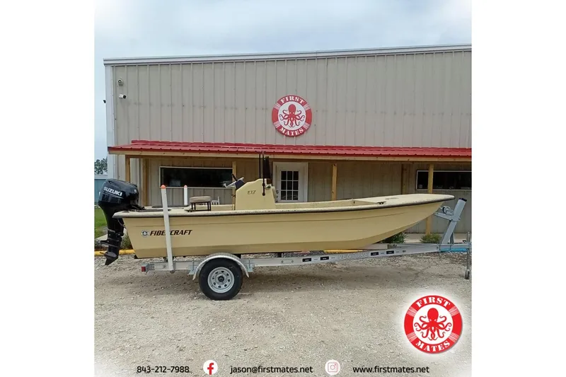 The Image of 2025 Fibercraft F17 boat on trailer outside First Mates building. - 1