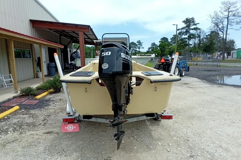 Slide: The Image of 2025 Fibercraft F17 boat with Suzuki 50 outboard motor on trailer. - 14