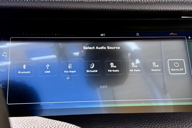 Slide: The Image of Touchscreen audio source selection in 2026 Nautique Super Air Nautique GS20 boat. - 18