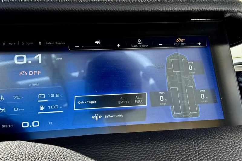 Slide: The Image of Dashboard display of 2026 Nautique Super Air Nautique GS20, showing speed, ballast, and system status. - 19