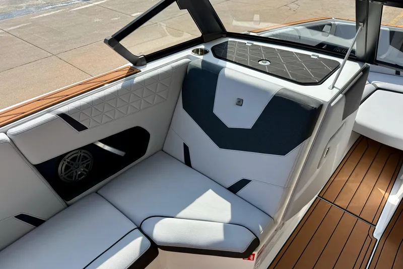 Slide: The Image of 2026 Nautique Super Air Nautique GS20 interior with sleek seating and modern design. - 25