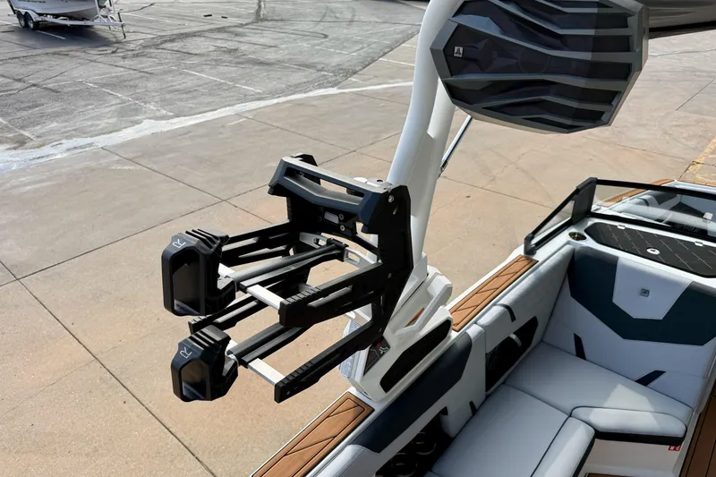 Slide: The Image of 2026 Nautique Super Air Nautique GS20 boat with wakeboard rack and speaker system. - 37