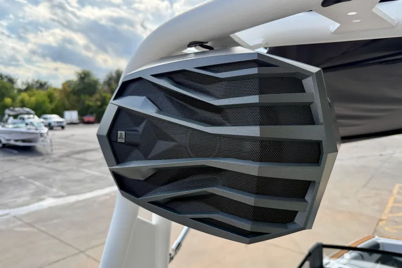 Slide: The Image of Close-up of a speaker on a 2026 Nautique Super Air Nautique GS20 boat. - 39