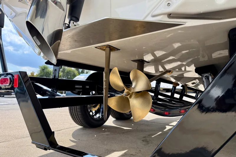 Slide: The Image of 2026 Nautique Super Air Nautique GS20 boat propeller and trailer detail. - 7
