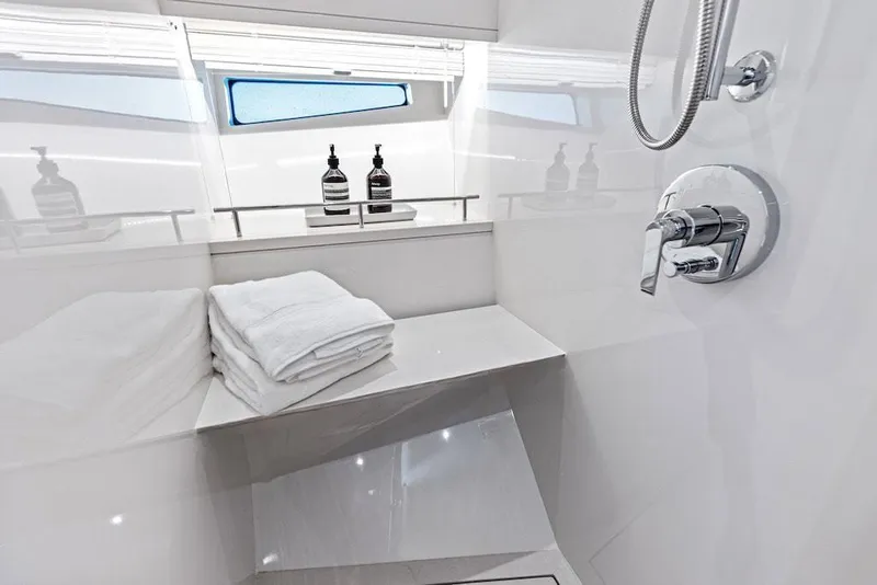 Slide: The Image of Manufacturer Provided Image: Luxurious bathroom in 2026 Scout 670 LXS yacht with modern fixtures and elegant design. - 21