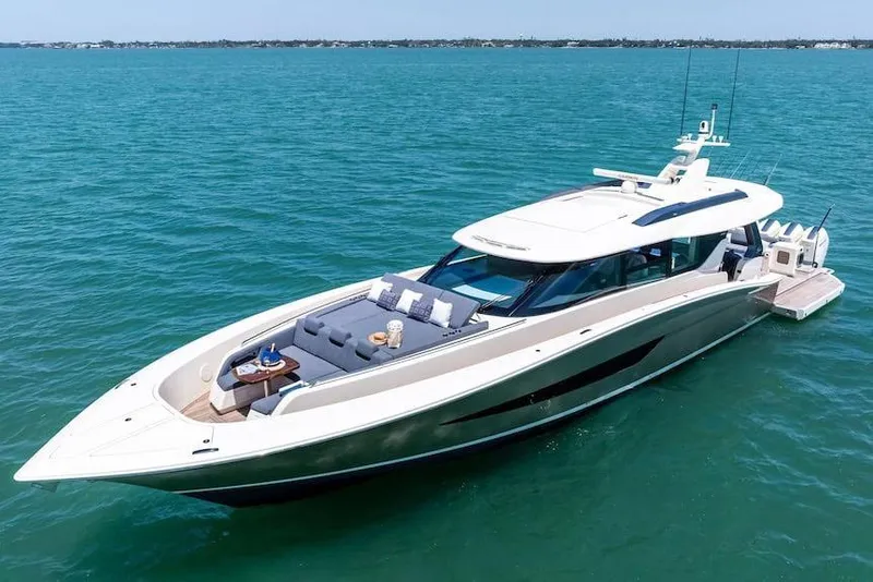 Slide: The Image of Manufacturer Provided Image: 2026 Scout 670 LXS luxury yacht cruising on clear blue water. - 3