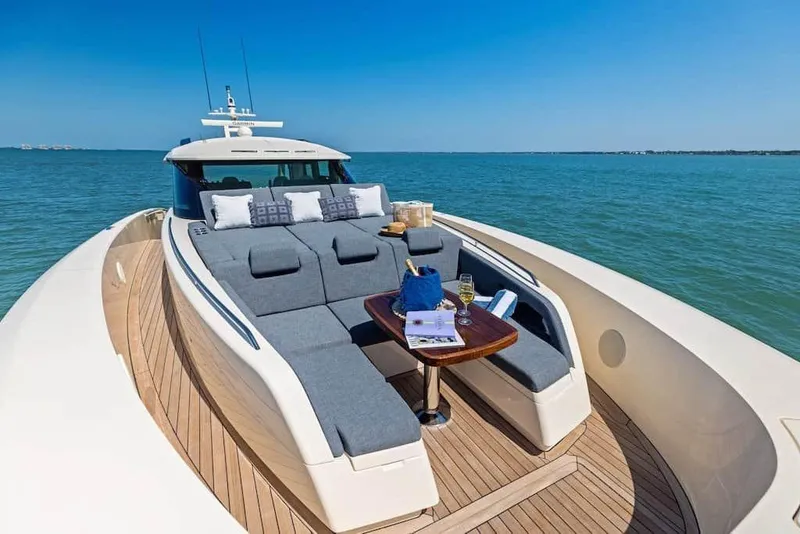 Slide: The Image of Manufacturer Provided Image: Luxurious 2026 Scout 670 LXS yacht with elegant deck seating on open water. - 7