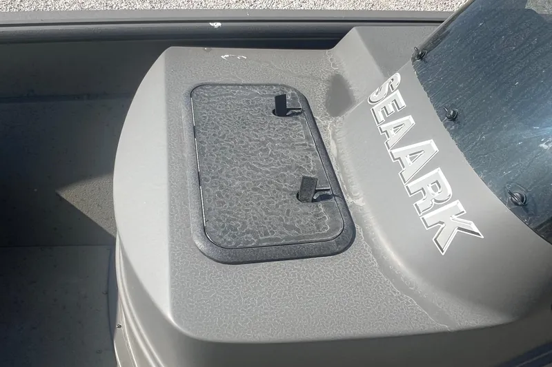 Slide: The Image of 2026 SeaArk V-Cat 200 SC boat console with textured surface and SeaArk branding. - 13