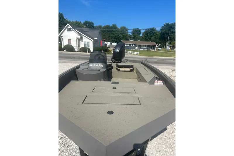 Slide: The Image of 2026 SeaArk Phantom 20XV boat on trailer in snowy outdoor setting. - 6