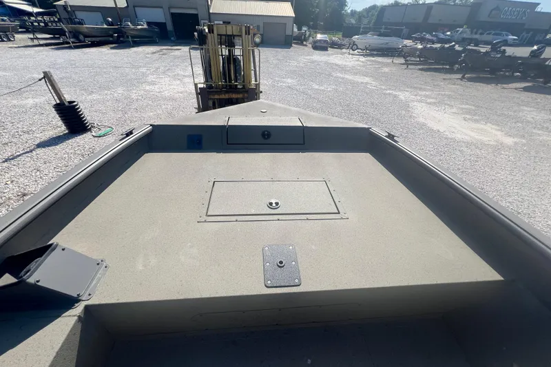 Slide: The Image of 2026 SeaArk V-Cat 200 SC with Suzuki outboard motor in a boatyard. - 8