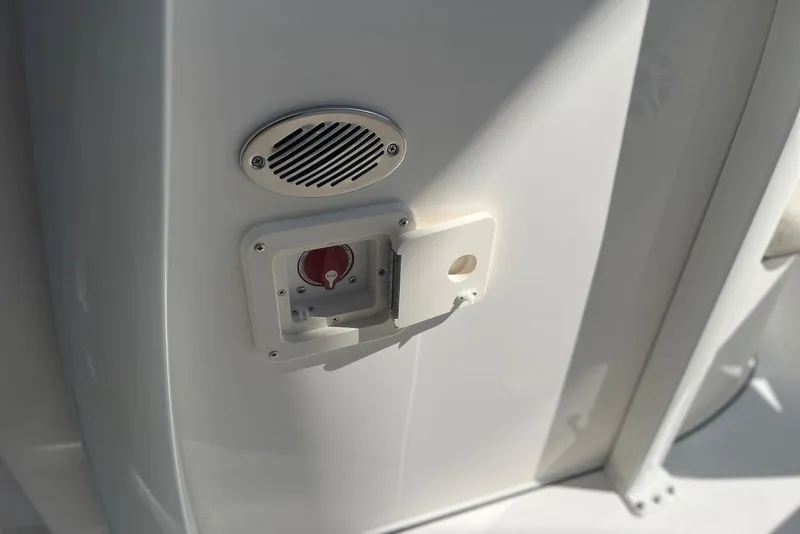 Slide: The Image of 2026 Key West 219 FS boat detail showing a speaker and control panel. - 21