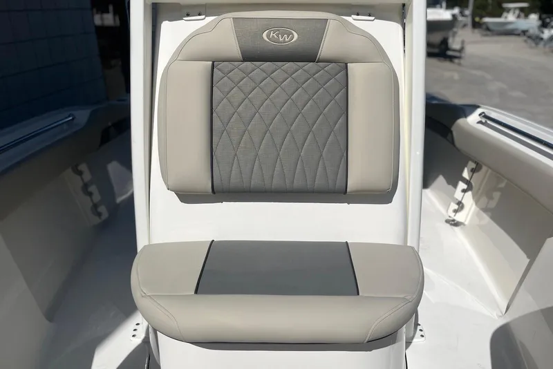 Slide: The Image of 2026 Key West 219 FS boat seat with gray and beige upholstery. - 22
