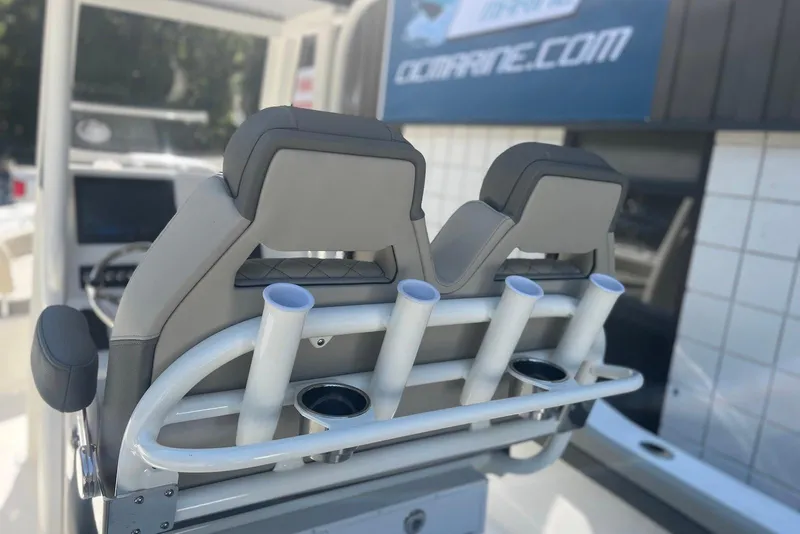 Slide: The Image of 2026 Key West 219 FS boat seats with rod holders, showcasing modern design. - 7