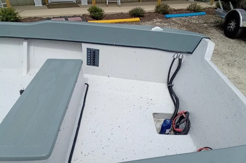 Slide: The Image of Interior of 2025 Fast Craft XR15 boat showing seating and wiring details. - 7