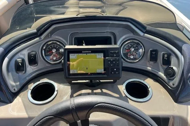 Slide: The Image of Dashboard of 2023 Sun Tracker Party Barge 22 DLX with Garmin GPS and gauges. - 2