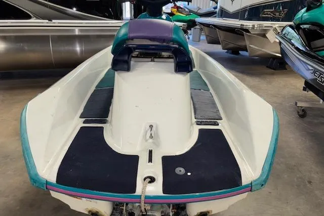 Slide: The Image of 1995 Yamaha WaveRunner Wave Venture jet ski in a showroom, rear view. - 4
