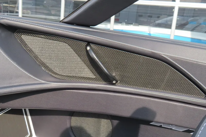 Slide: The Image of 2024 MTI 440X interior with carbon fiber accents and sleek design. - 18