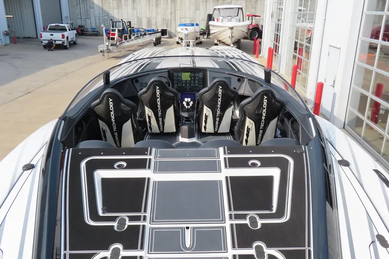 Slide: The Image of 2024 MTI 440X powerboat with sleek design and advanced marine technology features. - 9