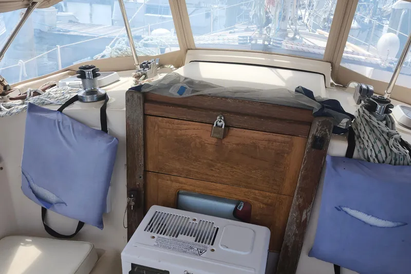 Slide: The Image of Cockpit of 1995 Island Packet 32 sailboat with winches and ropes. - 21