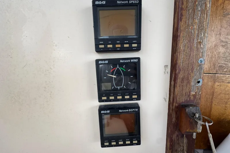 Slide: The Image of B&G marine instruments on a 1995 Island Packet 32 sailboat dashboard. - 29