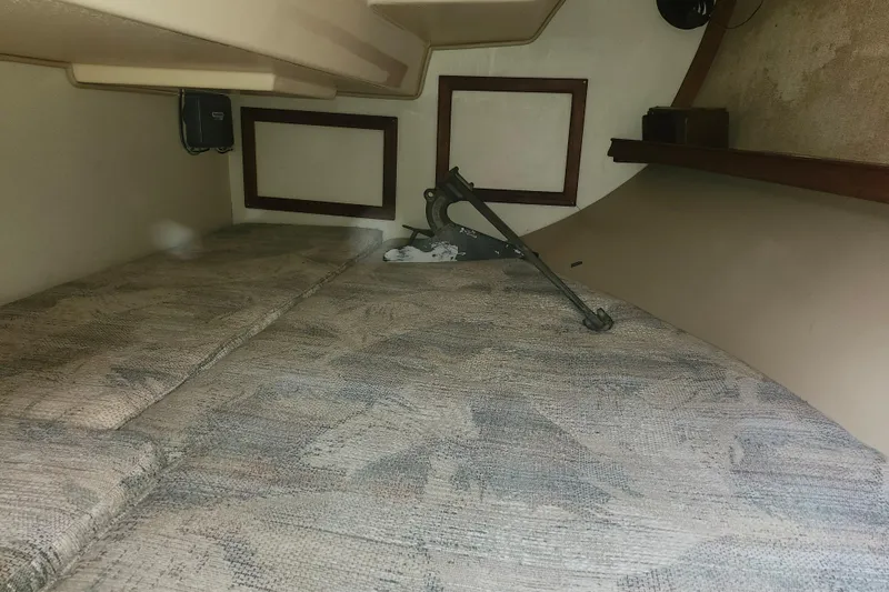 Slide: The Image of Interior cabin of a 1995 Island Packet 32 sailboat with anchor storage. - 36