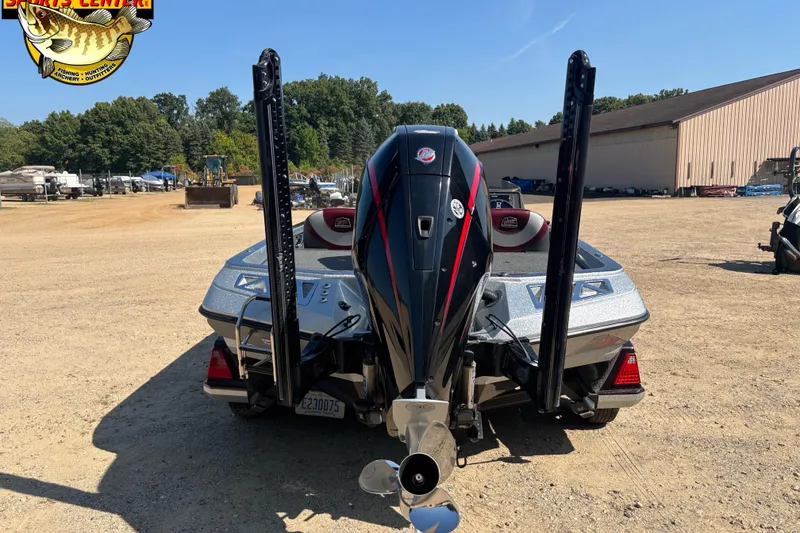Slide: The Image of 2019 Ranger Z520L boat with powerful outboard motor, parked outdoors on a sunny day. - 5