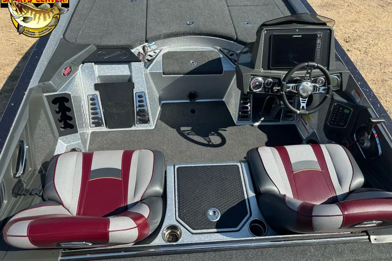 Slide: The Image of 2019 Ranger Z520L boat interior with dual seats, steering console, and control panel. - 6