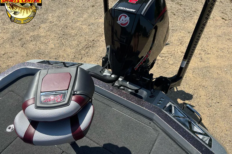 Slide: The Image of 2019 Ranger Z520L boat with Mercury engine and maroon seat on a sandy surface. - 8