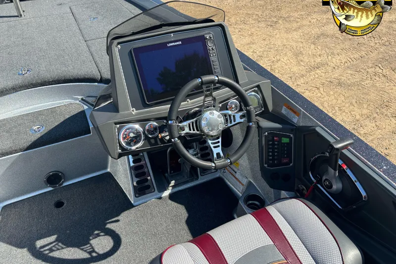 Slide: The Image of 2019 Ranger Z520L boat dashboard with steering wheel and navigation display. - 9