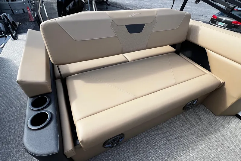 Slide: The Image of Luxurious beige seating on 2026 Evotti 521CS boat with cup holders and modern design. - 11