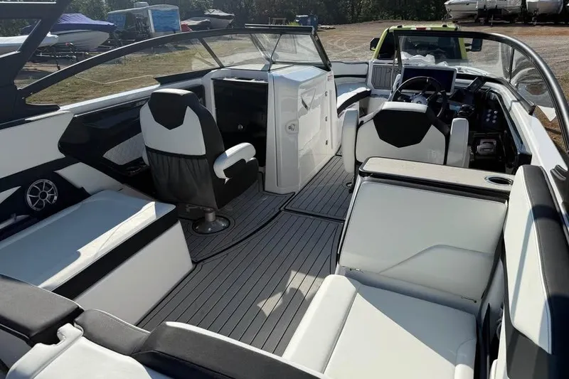 Slide: The Image of Interior of 2026 Yamaha Boats 252S, featuring sleek seating and modern dashboard design. - 6