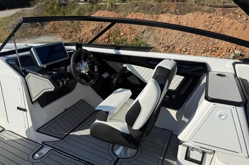 Slide: The Image of 2026 Yamaha Boats 252S cockpit with modern steering and dashboard design. - 7