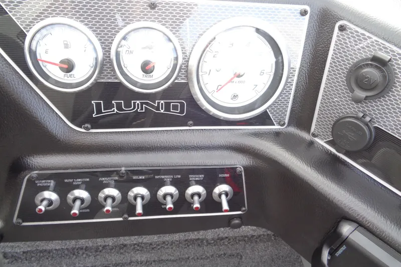 Slide: The Image of Dashboard of 2026 Lund 1875 Crossover XS boat with gauges and controls. - 18